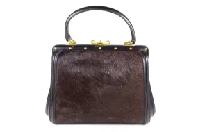 Black leather and brown fur frame handbag