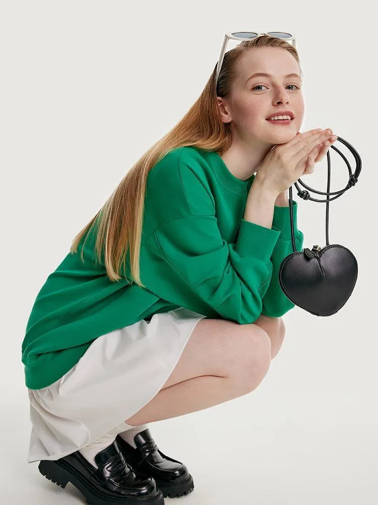 Faux Two-piece Hoodie Dress Paired With A Handbag